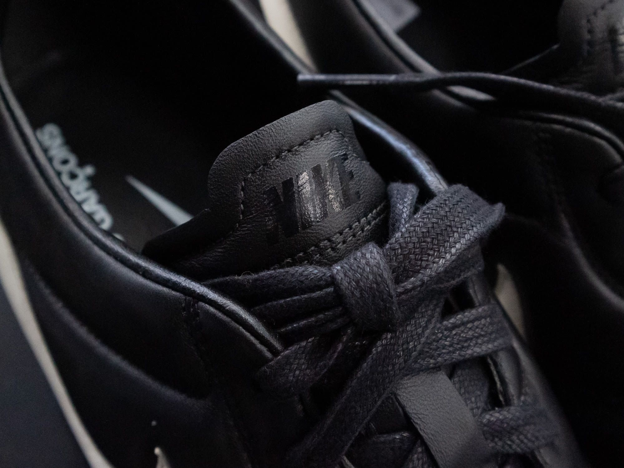 The football boots by Comme des Garçons and Nike