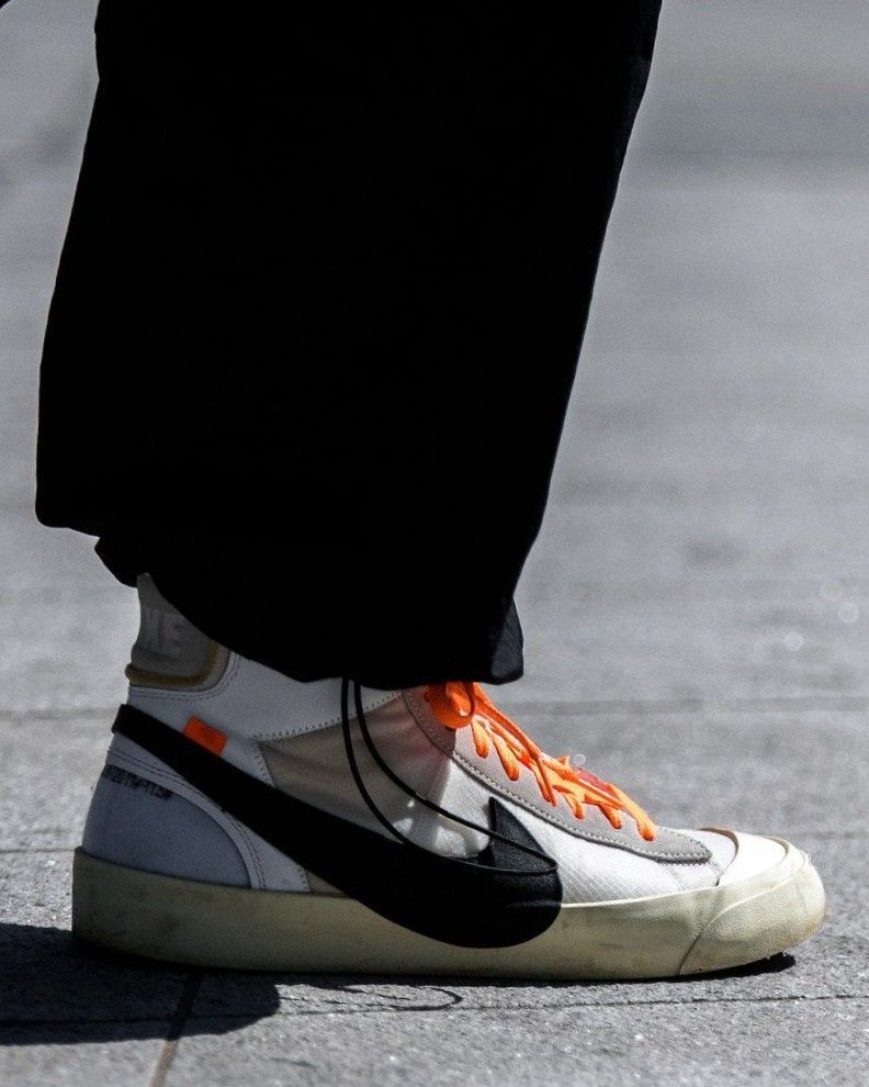 COMME des GARÇONS customized Nike Air Force 1 with dinosaurs