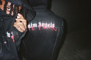 Playboi Carty and Palm Angels together with “Palm Angels Die Punk