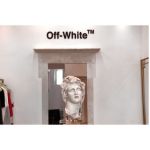 Luxury shopping in Mykonos: Louis Vuitton shop in a white …
