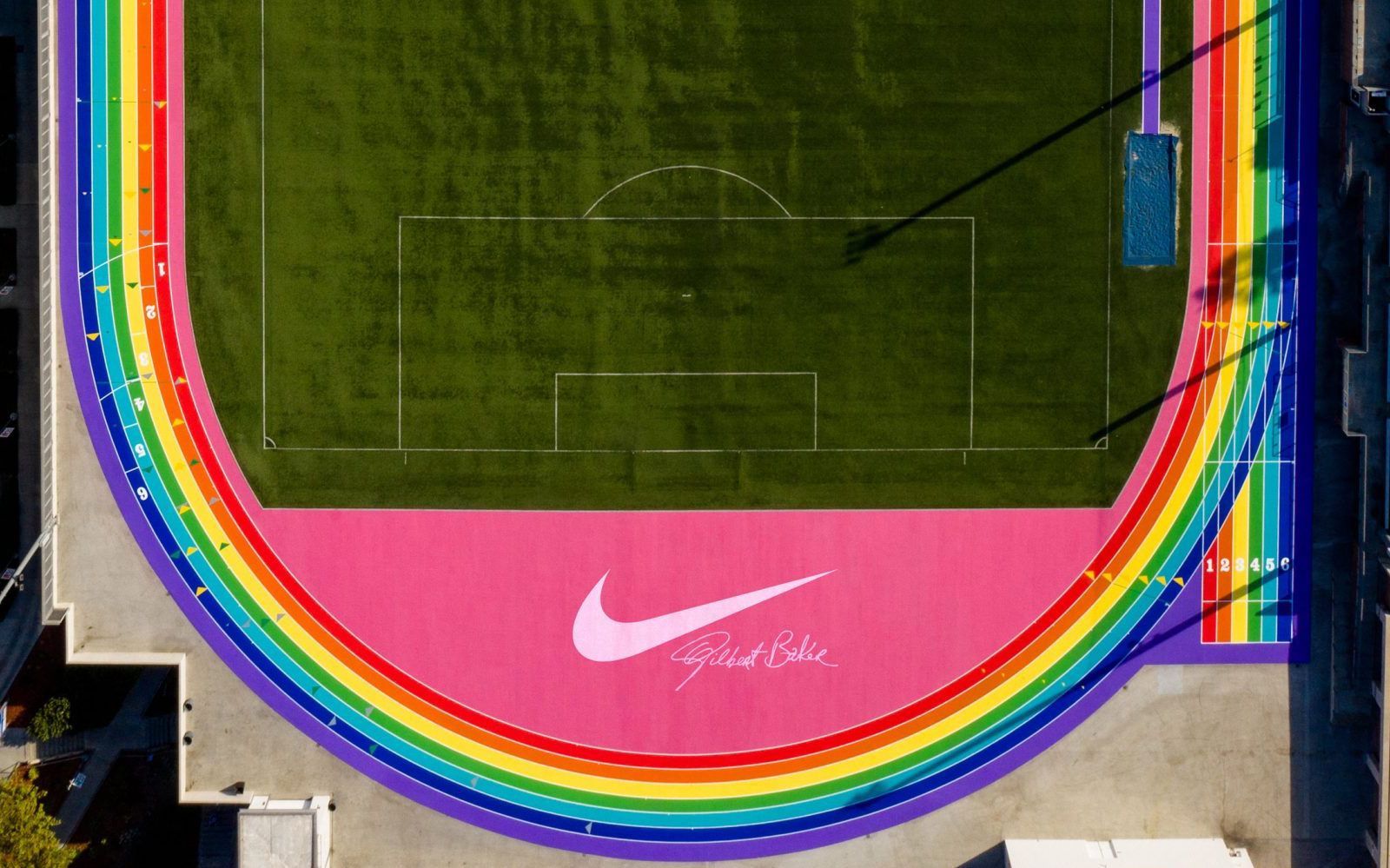 Systematisch beneden Wonen Nike customized a LA running track with the LGBT+ flag colors