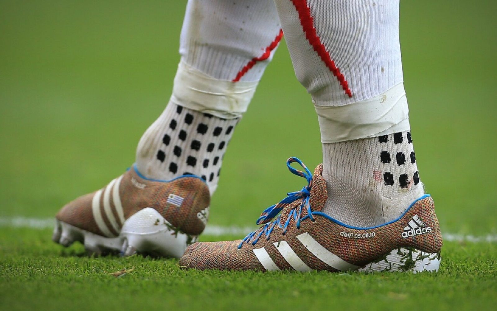 Why do so many footballers wear these socks?