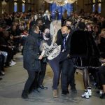 XR activist storms Louis Vuitton's Paris show but it's all smiles at Chanel, Chanel