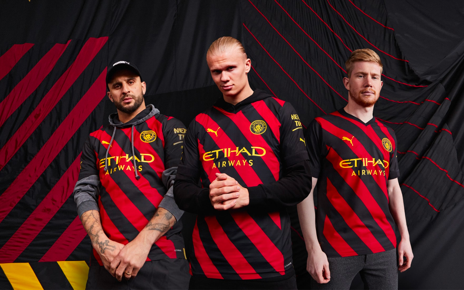 The red and black stripes are back on Manchester City's away jersey