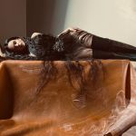 Rosalía is the new face of Acne Studios The singer wears items from the FW22 collection in shots by Dutch artist Paul Kooiker