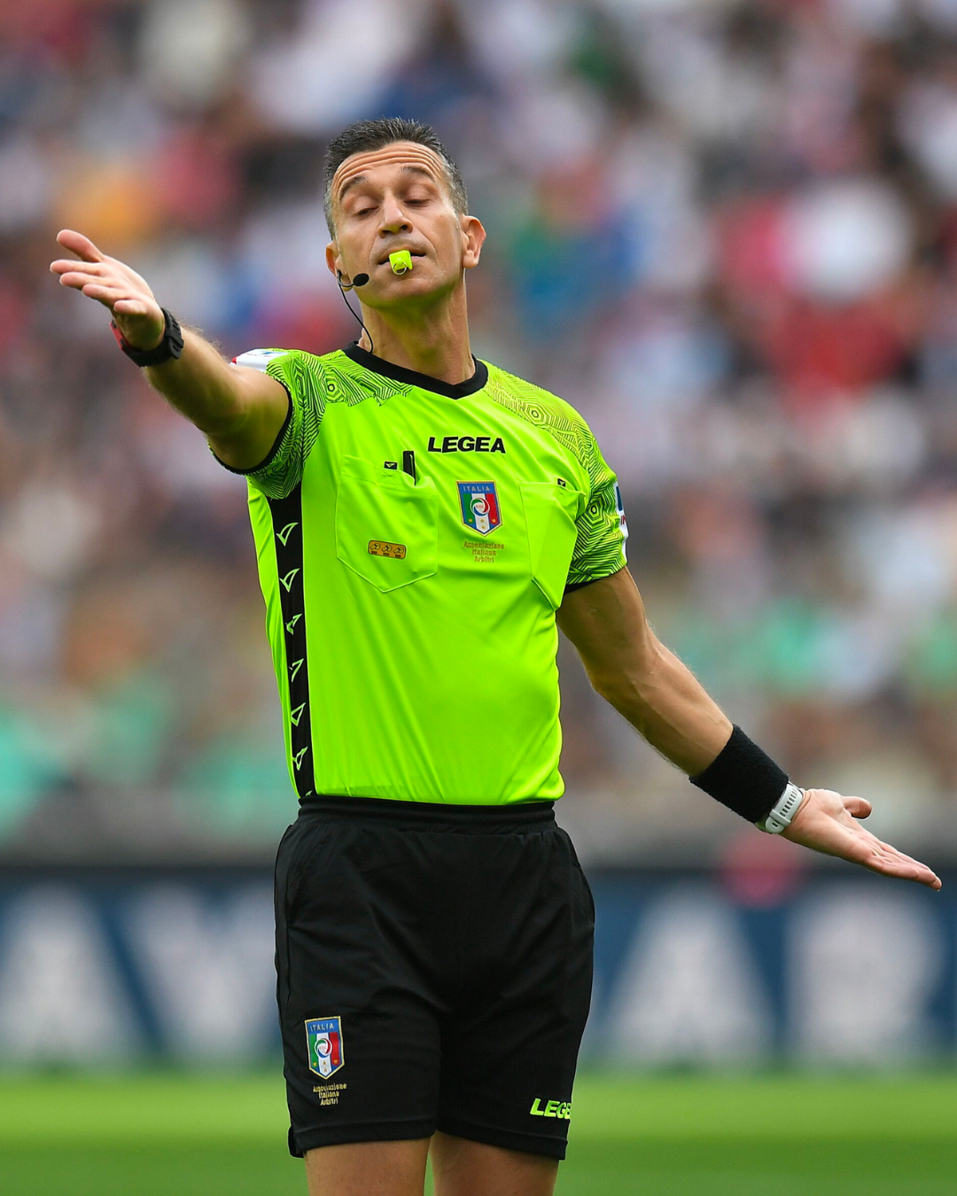 Why do Italian referees wear kits with the old logos?