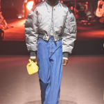 MILAN - JANUARY 14: Man with Alpha Industries blue bomber jacket and red Louis  Vuitton Supreme pouch before MSGM fashion show, Milan Fashion Week stre  Stock Photo - Alamy