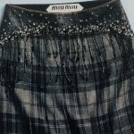 Miu Miu's Christmas is Upcycled, a sustainable collection between past and present The actress Emma Corrin is wearing it, photographed by Lengua | Image 542838