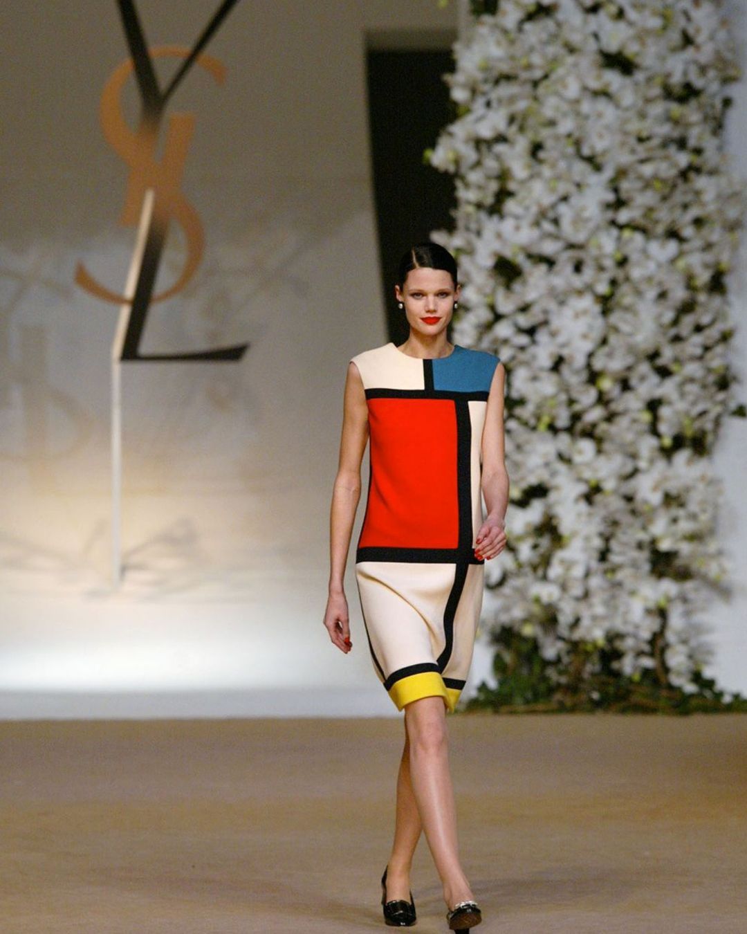 All the times Mondrian has meddled in fashion From Saint Laurent trapeze dresses of yesteryear to the Loewe bags of today