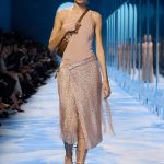 Metallic is the sizzling (and surprisingly versatile) trend for spring/summer 2025 Quicksilver on the skin, but also gold, bronze, and metallic finishes | Image 567638