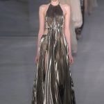 Metallic is the sizzling (and surprisingly versatile) trend for spring/summer 2025 Quicksilver on the skin, but also gold, bronze, and metallic finishes | Image 567652