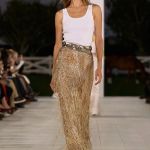 Metallic is the sizzling (and surprisingly versatile) trend for spring/summer 2025 Quicksilver on the skin, but also gold, bronze, and metallic finishes | Image 567639