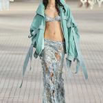 Metallic is the sizzling (and surprisingly versatile) trend for spring/summer 2025 Quicksilver on the skin, but also gold, bronze, and metallic finishes | Image 567656