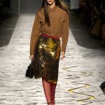 Metallic is the sizzling (and surprisingly versatile) trend for spring/summer 2025 Quicksilver on the skin, but also gold, bronze, and metallic finishes | Image 567641