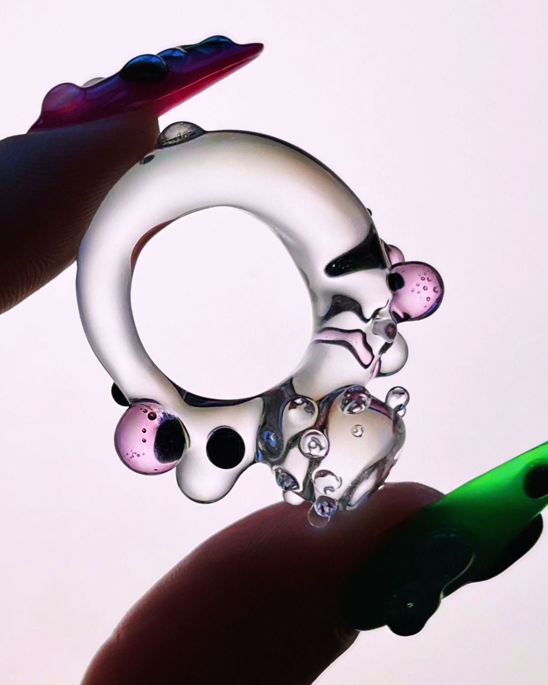 The double-edged charm of JoliPNJ rings, as told by their designer Interview with Chloé Foulquier, the designer who replaces diamonds with glass