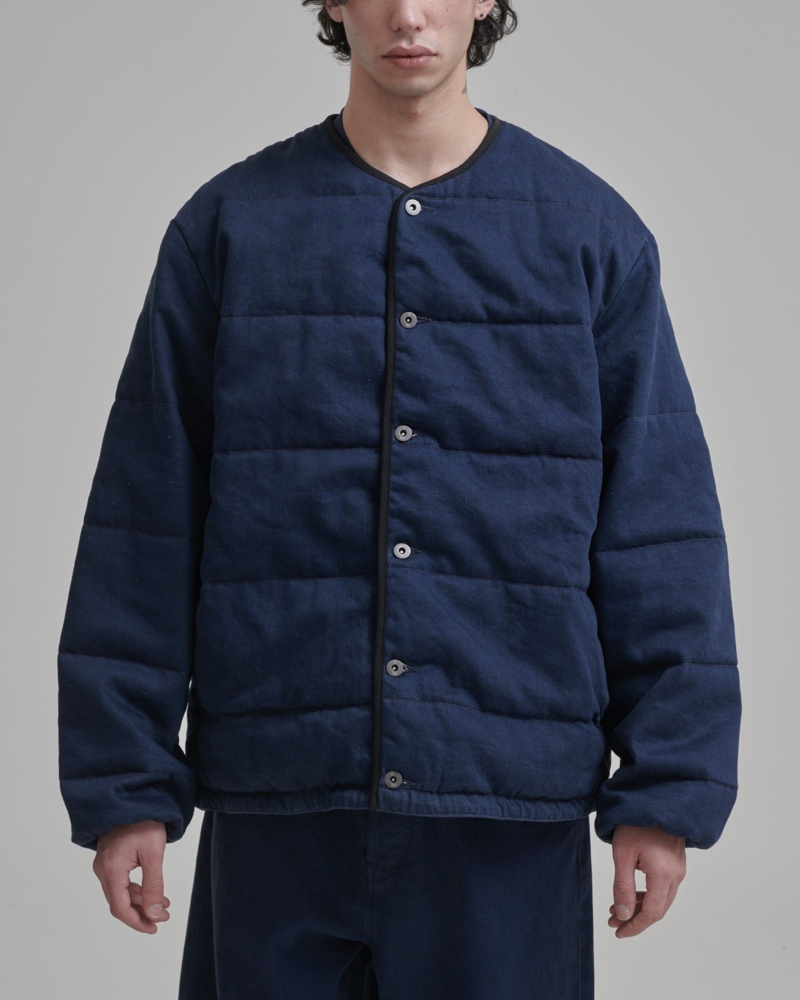 In the deep blue of the glaciers with the FW26 collection by TRC Contemporary design, high-performance technical materials, and a constant commitment to sustainability