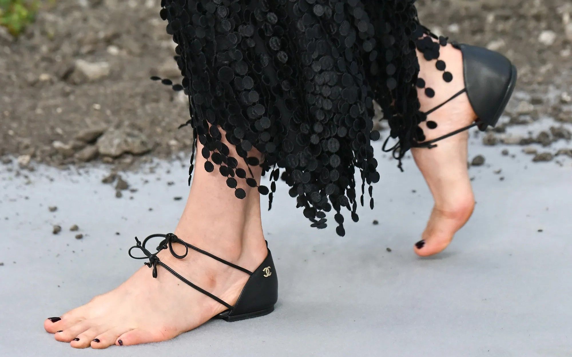 Will Chanel's viral sandals worn by Margaret Qualley kick off the “shoes-without-shoes” trend? They're weird, we know, but at least they'll get people talking