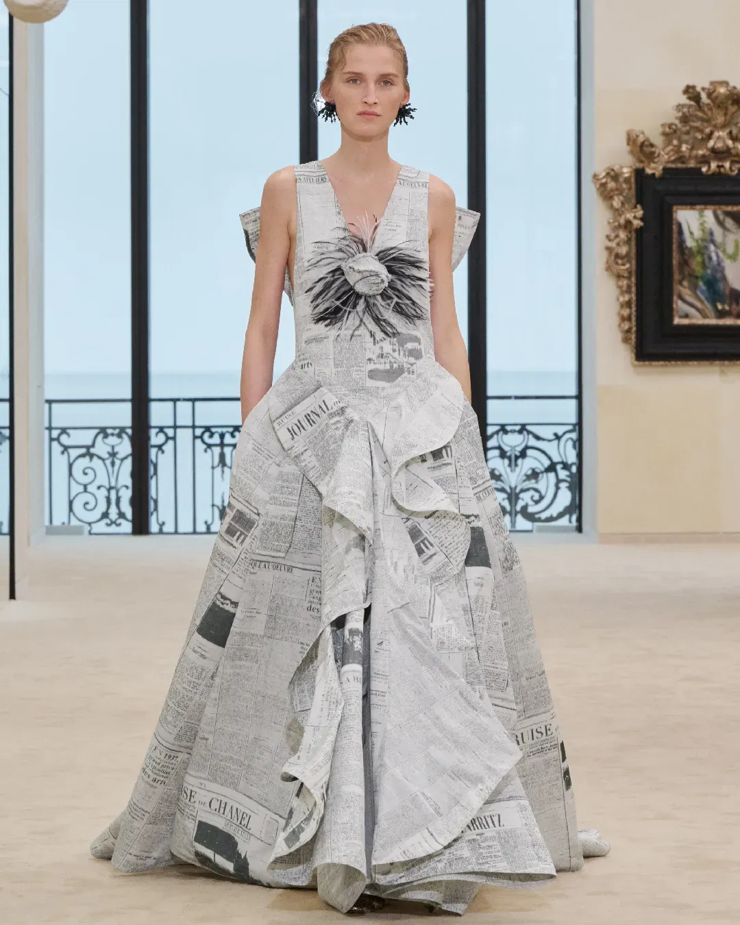 The Newspaper Dress is more controversial than you might think  From Schiaparelli to Galliano, the dress on Chanel’s runway brings old concerns back to the surface