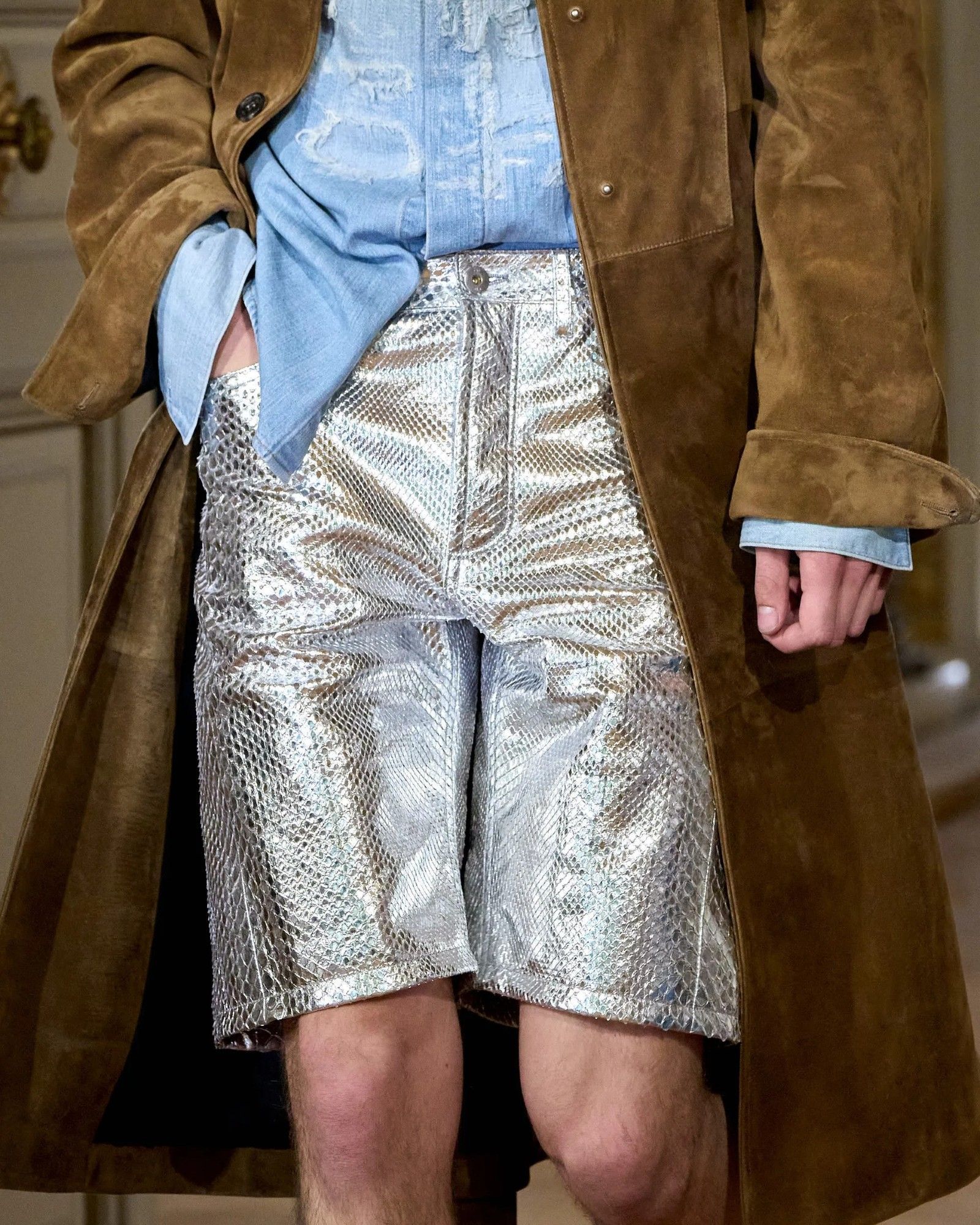 Do men really want such shiny, glittery clothes? From silver trousers to glitter and sequins, an eccentric trend is making its way down the runway