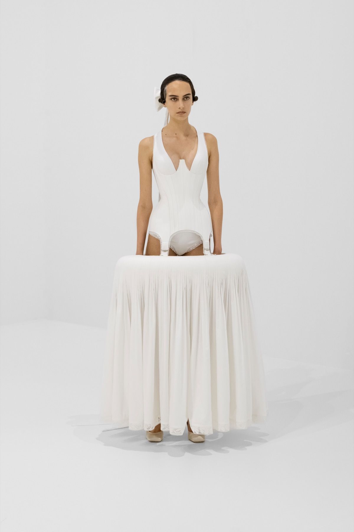 The Poetics of shapes and volumes in Jean Paul Gaultier's Couture 2027 Duran Lantik's debut collection is an ode to the brand's heritage and that of France as a whole | Image 626421
