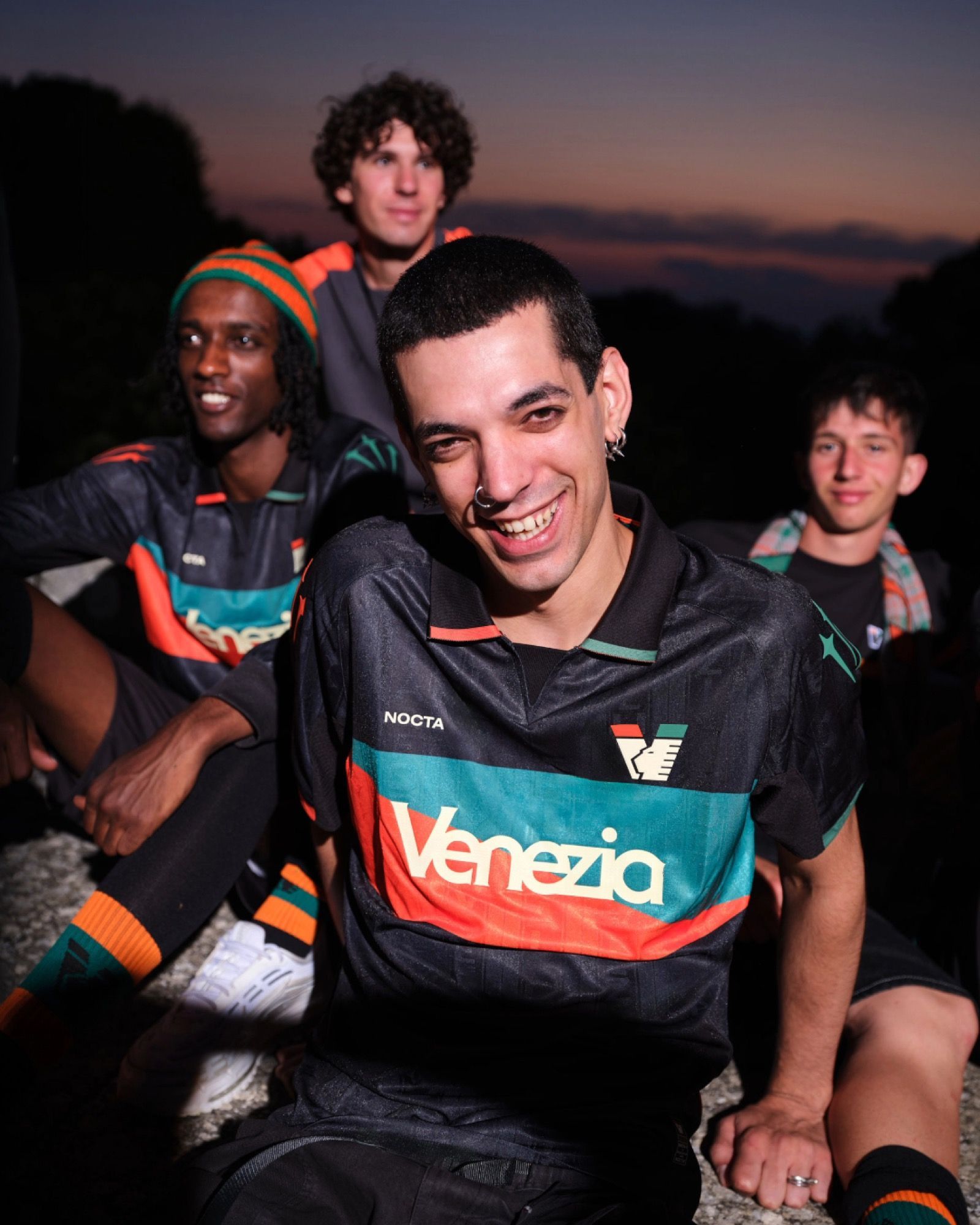 Venezia unveil their new home jersey for their return to Serie A Once again designed by NOCTA, it draws inspiration from the club's orange and green flags